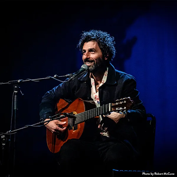 José González playing guitar